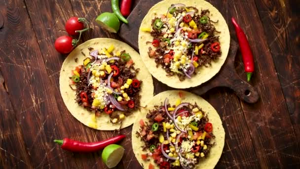 Healthy corn tortillas with grilled beef, fresh hot peppers, cheese, tomatoes - Footage, Video