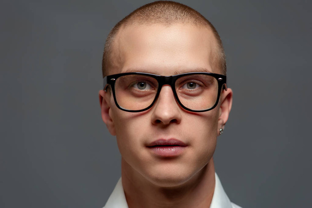 Portrait of a young man a manager in glasses - Фото, зображення