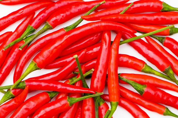 Red chili peppers arranged - Fotoğraf, Görsel