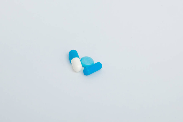 Macro view of capsule pill and tablet isolated over white backgr - Photo, Image
