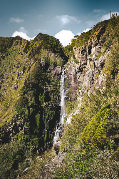 View towards Waterfall in Nordeste Near Lighthouse Ponta do Arnel in Sao Miguel island, Azores - 写真・画像