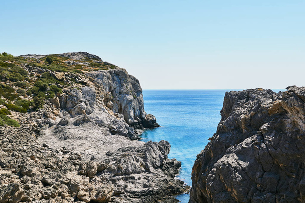 rocky cliff on the seacoast island of Rhodes - Фото, зображення