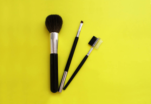 A set of brushes for makeup on a bright background. - Photo, Image