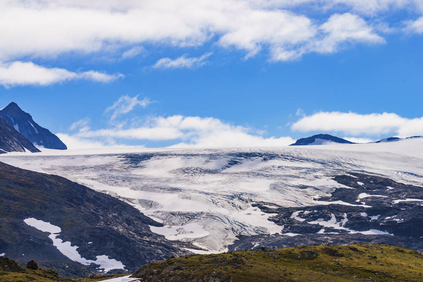 Mountains with ice glacier. Road Sognefjellet, Norway - 写真・画像