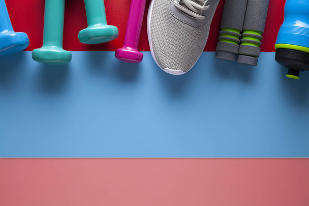Sports and fitness equipment on colored background - Fotografie, Obrázek