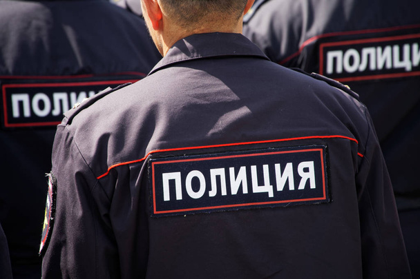  Mundur rosyjskiej policji. Widok z tyłu - Zdjęcie, obraz