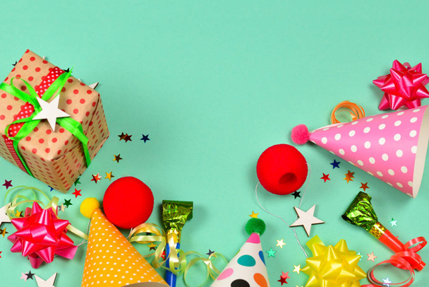 Birthday caps,  present, confetti, ribbons,  stars,  clown noses - Valokuva, kuva