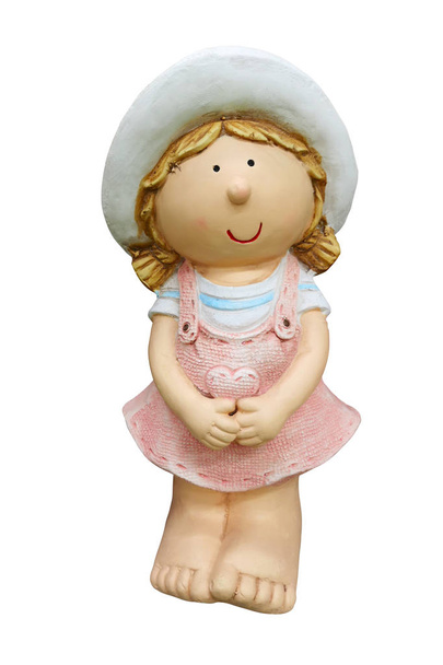 Ceramic figure of a little girl gardening. Decorative toy sculpture for the garden. Souvenir. Isolated on white background - Photo, Image