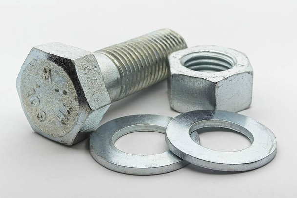 Steel nut, bolt and washers on white background - Photo, Image