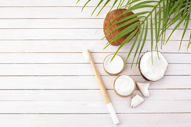 Coconut oil and mint homemade toothpaste, eco friendly bamboo toothbrush, natural healthcare. - Fotoğraf, Görsel