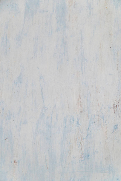 pale blue color on a metallic surface - Фото, зображення