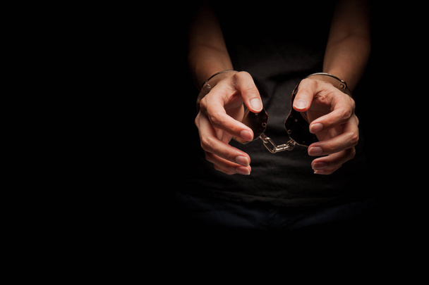 concept human trafficking,hand girl in shackle on isolate black background - Fotografie, Obrázek