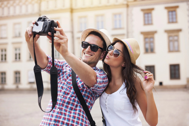 Boldog turisták fénykép magukat - Fotó, kép