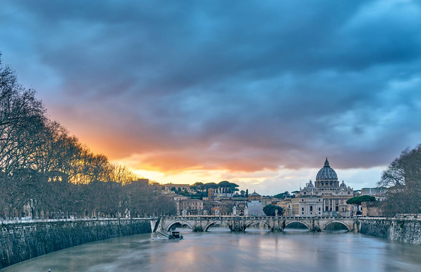 St. Peter's cathedral and Tiber river at evening in Rome - Photo, Image