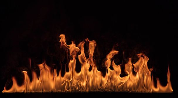 Texture of fire on a black background. - Zdjęcie, obraz