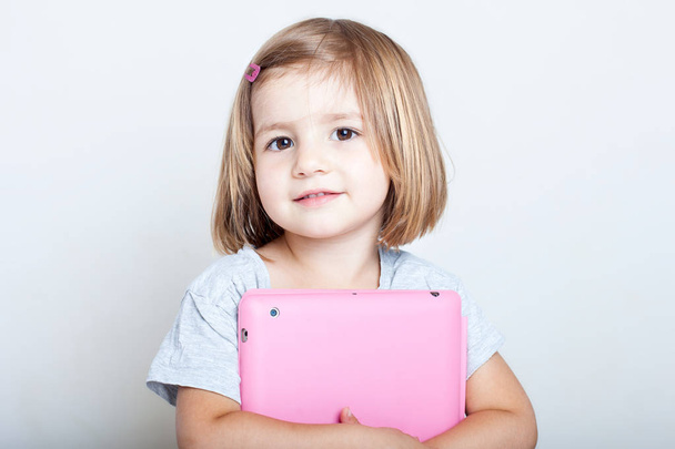 little  girl with tablet  and diary ready to school - Photo, Image