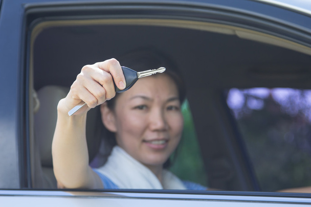 woman with car key - Photo, Image