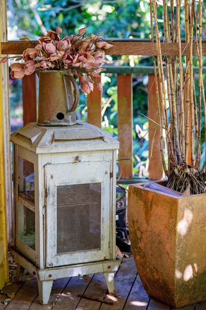 Collection Of Dirty Old Furniture And Plants On A Vintage Wooden Verandah - Photo, Image