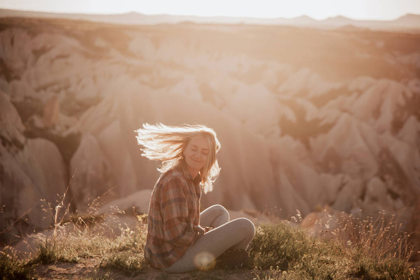 beautiful woman traveler at mountains on sunset. travel, lifesty - Photo, Image