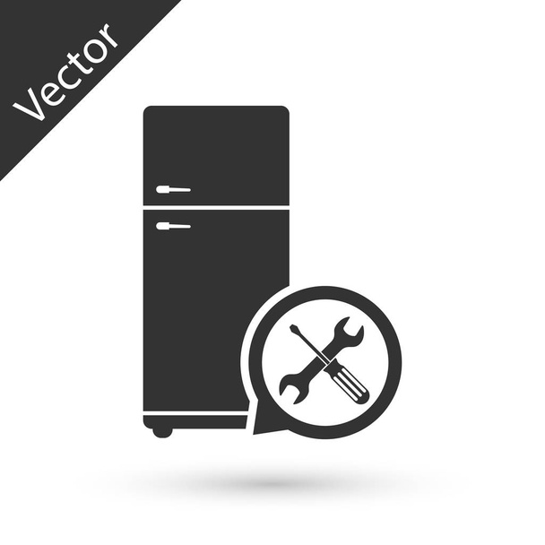 Refrigerador gris con destornillador e icono de la llave inglesa aislado en w
 - Vector, imagen