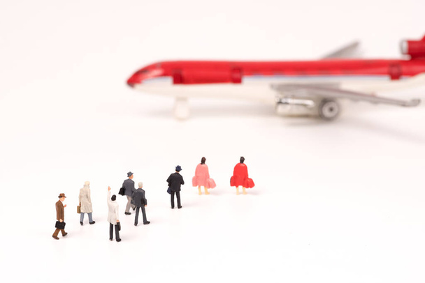 Miniature people, businesses team walking to airplane - Photo, Image