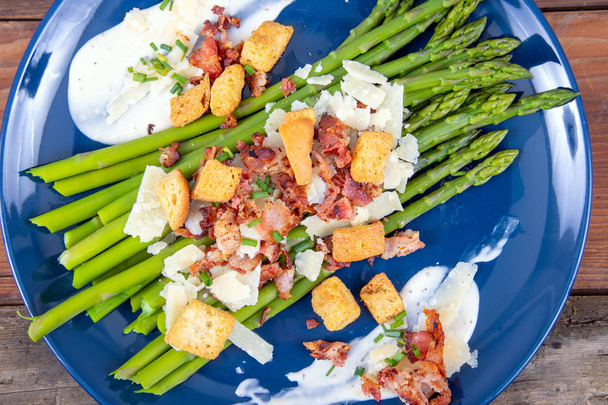 caesar asparagus with sliced parmesan cheese bacon and crouton g - Photo, Image