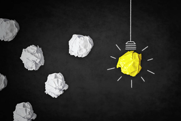 creativity concept -  inspiration light bulb and crumpled papers - 写真・画像
