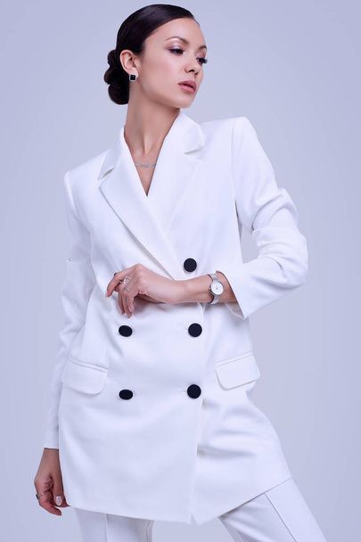 Gorgeous latin women in fashion white suit - Photo, Image
