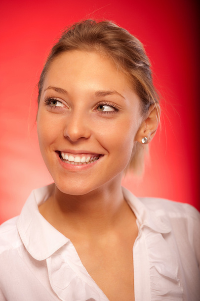 Portrait of smiling young woman - Photo, Image