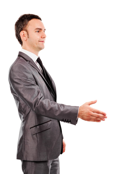 Young businessman with an open hand ready to seal a deal - Foto, immagini