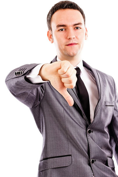 Disappointed young business man showing thumb down sign - Foto, Bild