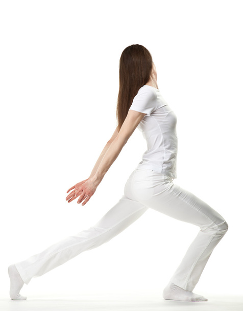 Slender young woman exercising - Zdjęcie, obraz