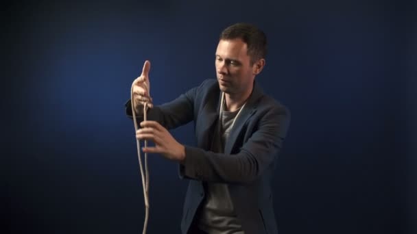 Video of magician man with ropes - Footage, Video
