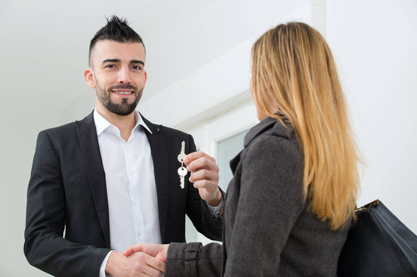 smiling woman meeting with realtor - Photo, image