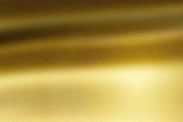 Licht leuchtet auf Goldwellenblech im dunklen Raum, abstrakte Textur Hintergrund - Foto, Bild