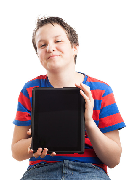 Teenager boy holding tablet computer - 写真・画像