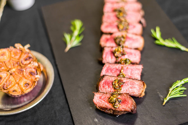 New york strip porterhouse steak beef meat with garnished and spices - Photo, Image