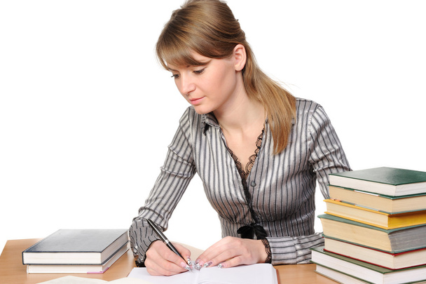 Businesswoman with books on table - Photo, Image