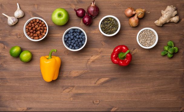 Healthy eating ingredients: fresh vegetables, fruits and superfood. Nutrition, diet, vegan food concept - Fotó, kép