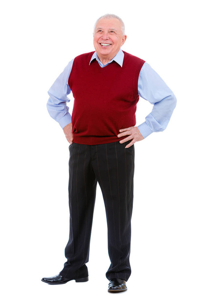 Full length portrait of happy and white teeth smile senior old man, hands on a waist, wearing cardigan marsala color and shirt, isolated on white background. Human emotions and facial expressions - 写真・画像