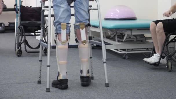 Man With Prosthetic Legs Walks - Footage, Video