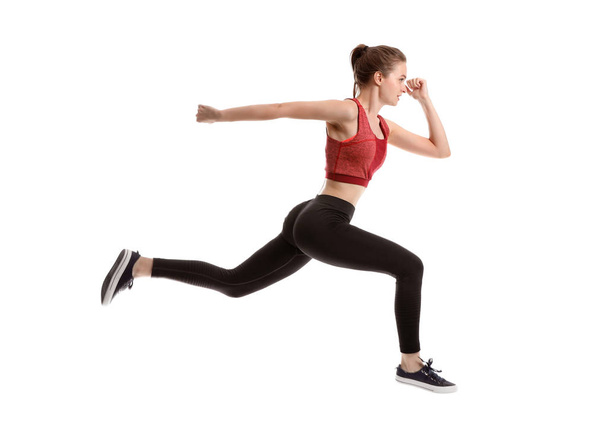 Bieganie sportowa kobieta na białym tle - Zdjęcie, obraz
