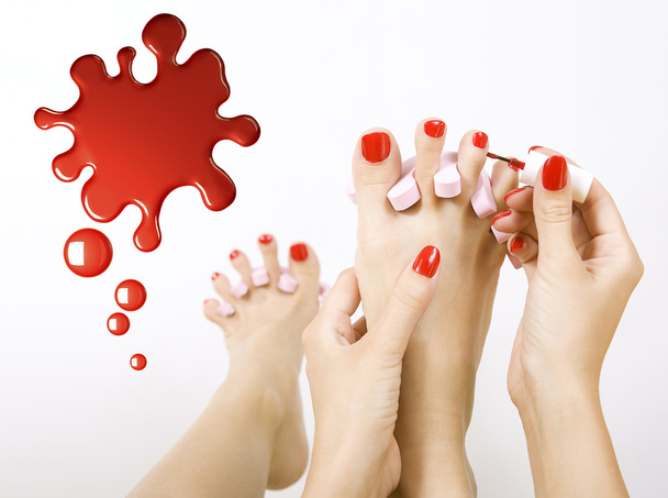 pedicure process - red manicure and pedicure - Foto, Imagen