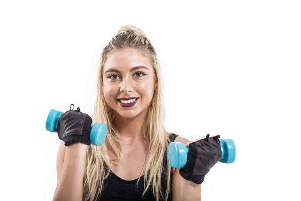 schön fitte Frau beim Training mit Kurzhanteln - Foto, Bild
