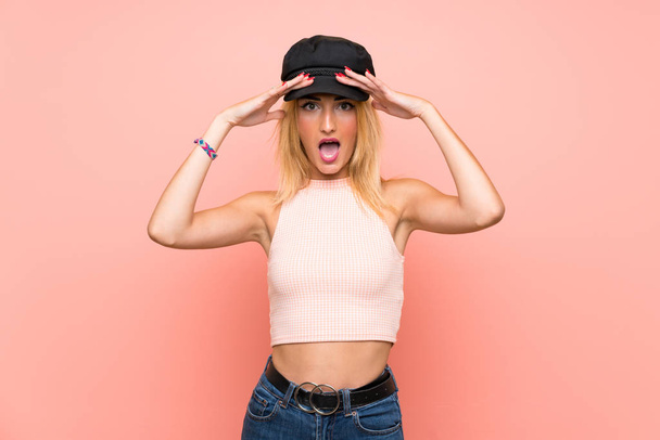 Young blonde woman with hat with surprise expression - Photo, Image