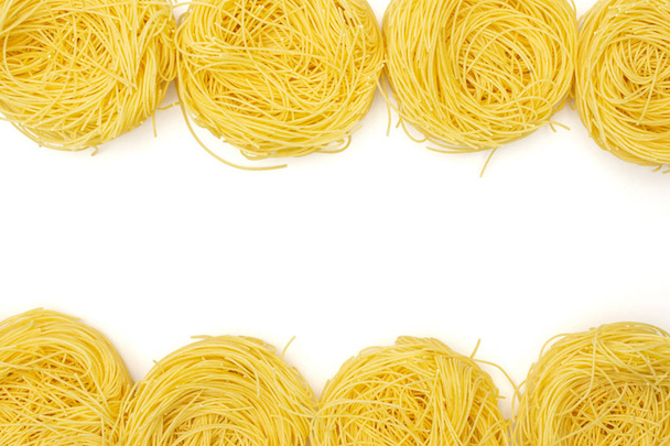 Angel hair pasta isolated on white - Foto, Imagen