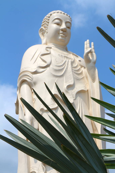 Kövér Buddha-fej, nevetve - Fotó, kép