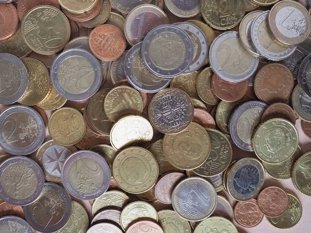 Monedas en euros, la Unión Europea como fondo
 - Foto, imagen