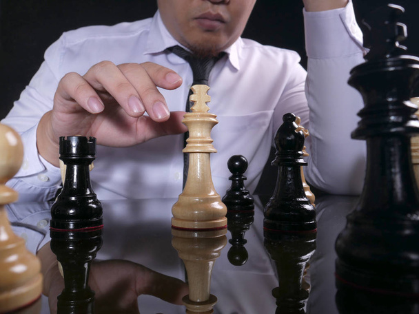 Businessman Playing Chess - 写真・画像