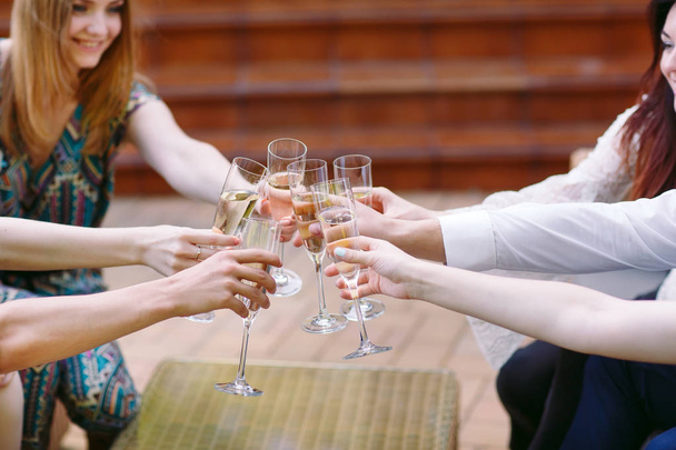 Celebration. People holding glasses of champagne making a toast. - Valokuva, kuva